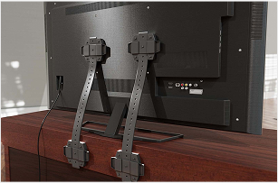 Photo of a television secured to a cabinet.